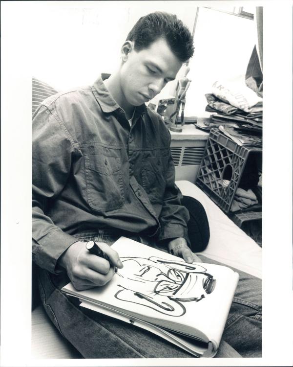 Jake Tapper drawing a cartoon while at Dartmouth