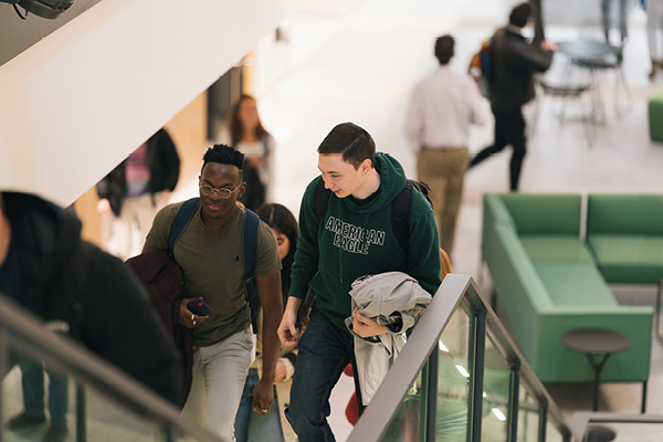 students walking up the stairs inside the Engineering Computer Science Center