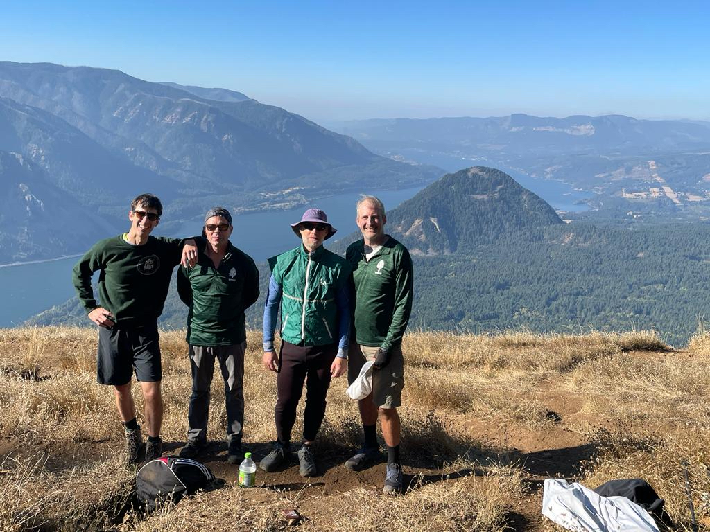 Steve Hochman ’88, Jeff Albright ’88, Paul Blackburn ’88, and Brad Grenham ’88 atop Dog Mountain at the Columbia River Gorge, Washington-Oregon border