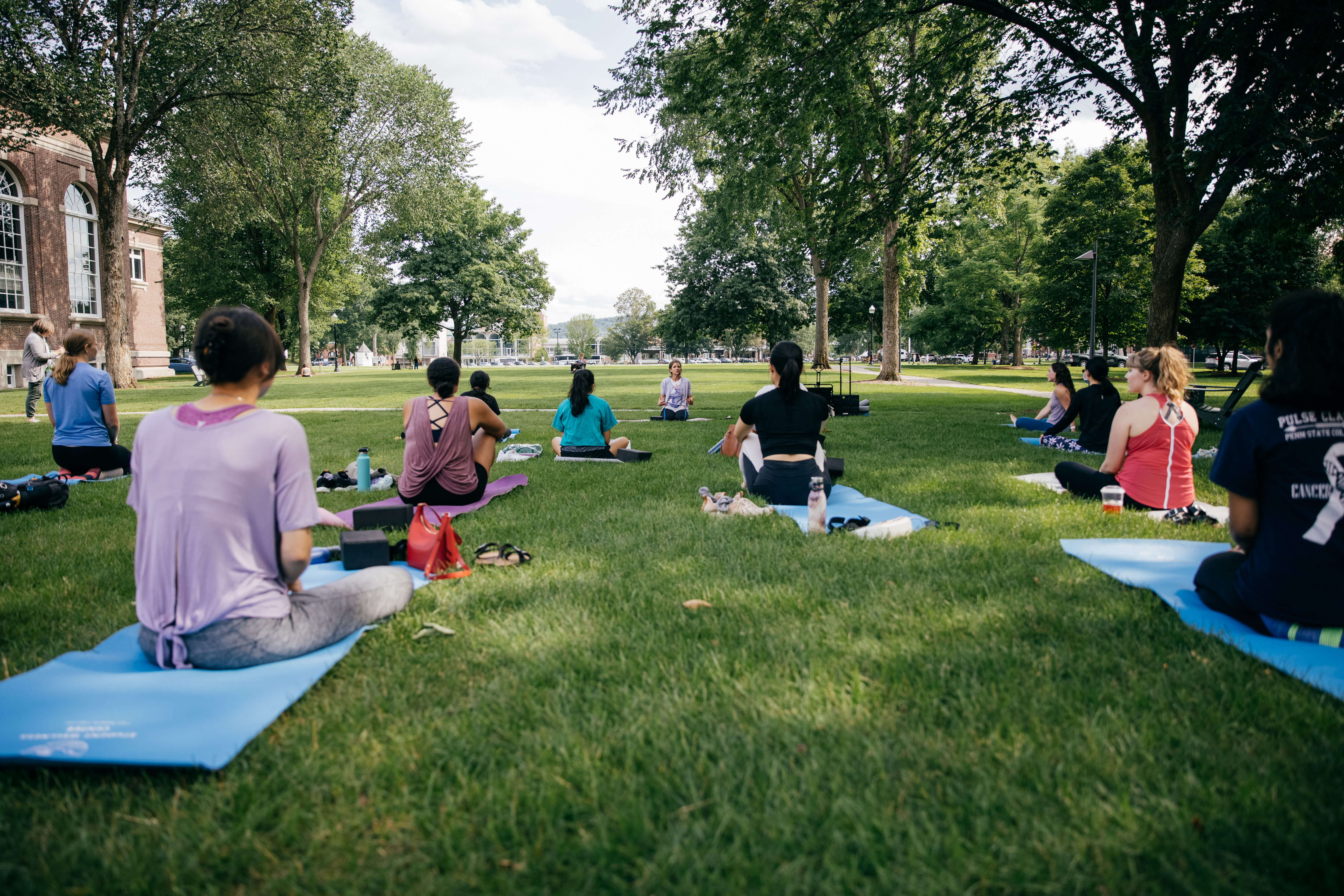Students doing yoga on Barker Lawn