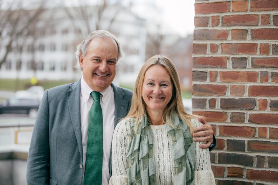 Smiling man and woman outside