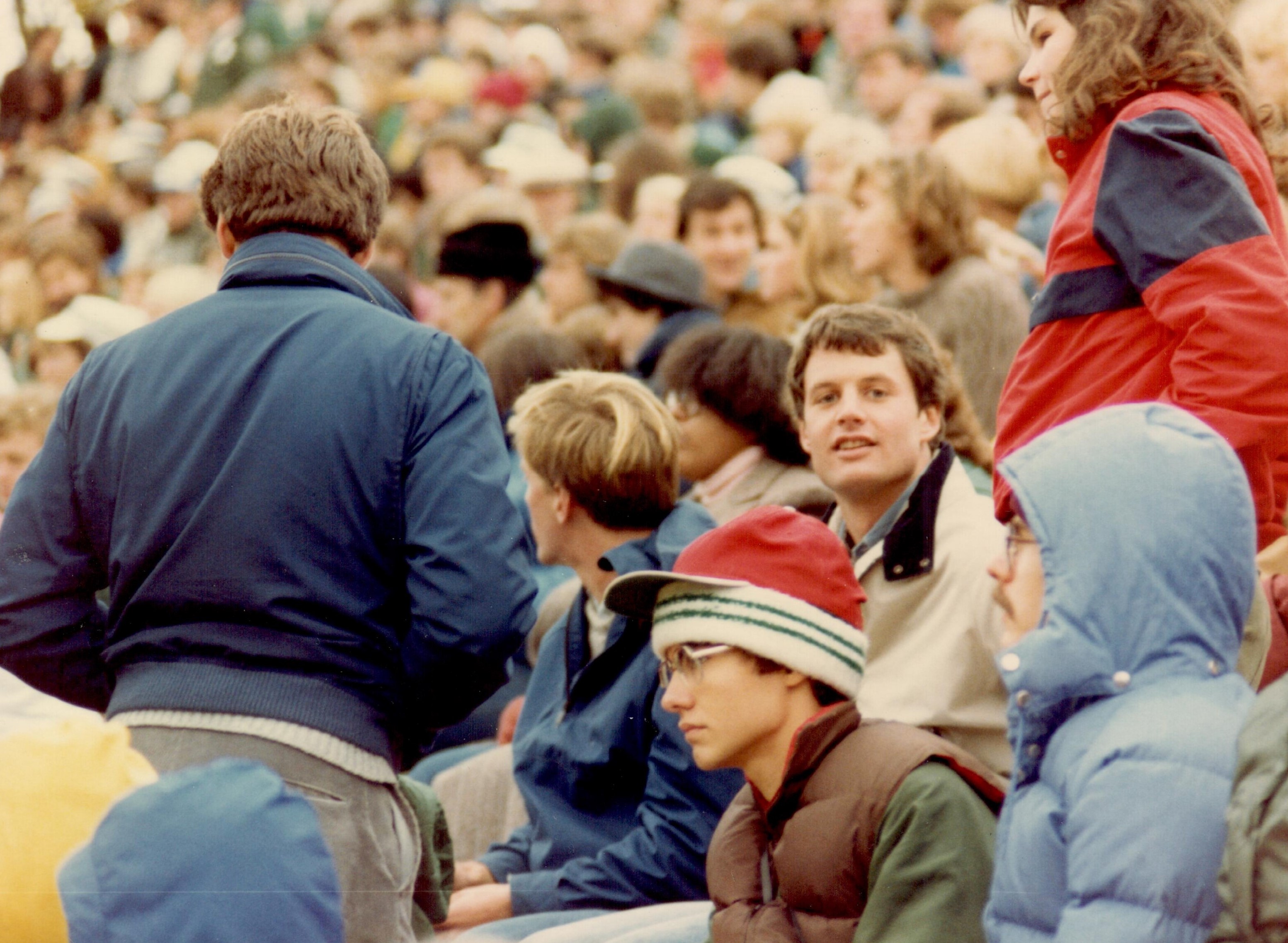 A young Donahoe in a crowd of students