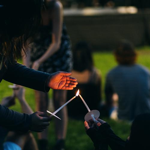 Students light candles during vigil on campus (Photo: Eli Burakian '00)