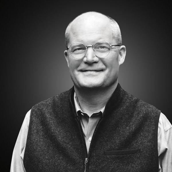 David McKenna in black and white portrait photo 