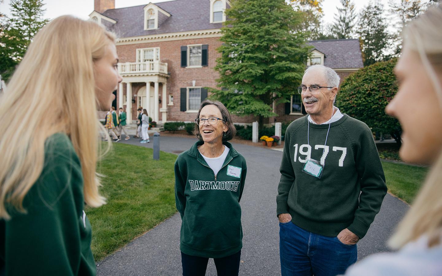 President Philip J. Hanlon ’77 and his wife Gail M. Gentes ’77a talking to students