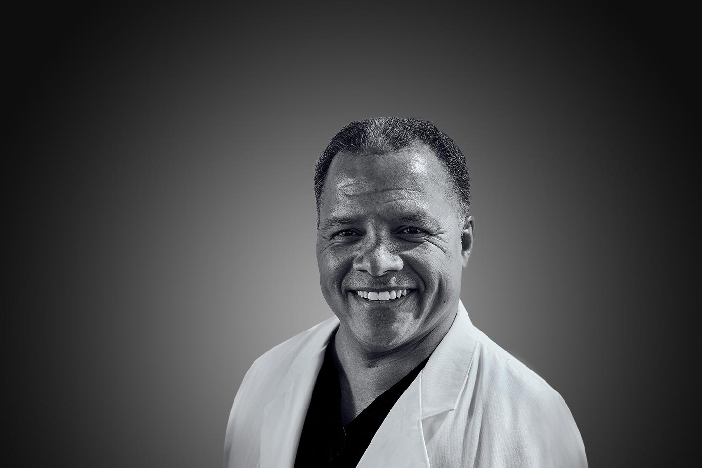 Black and white portrait of Dr. Robert S. Higgins II ’81 P’14