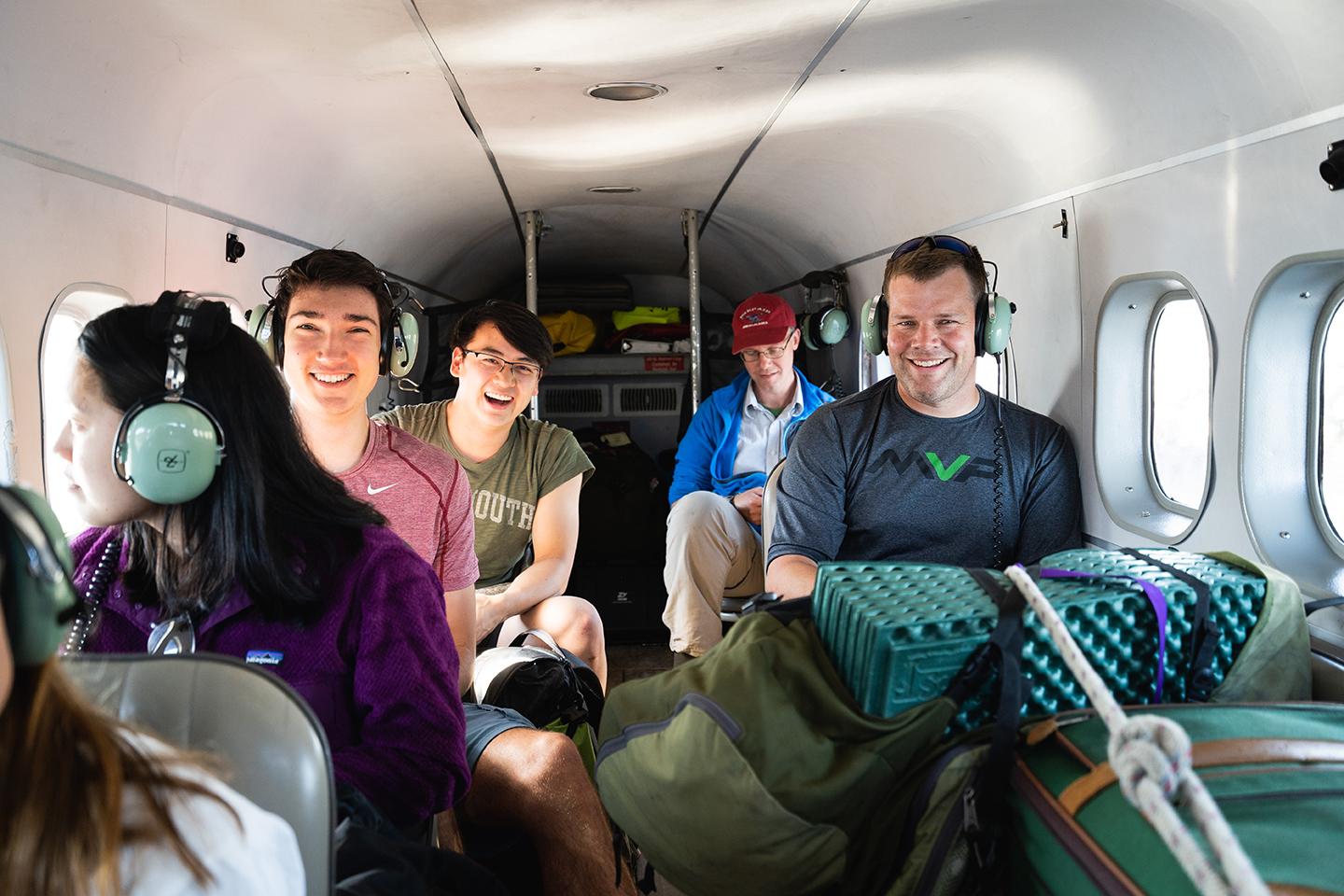Dartmouth students on a plane to Alaska
