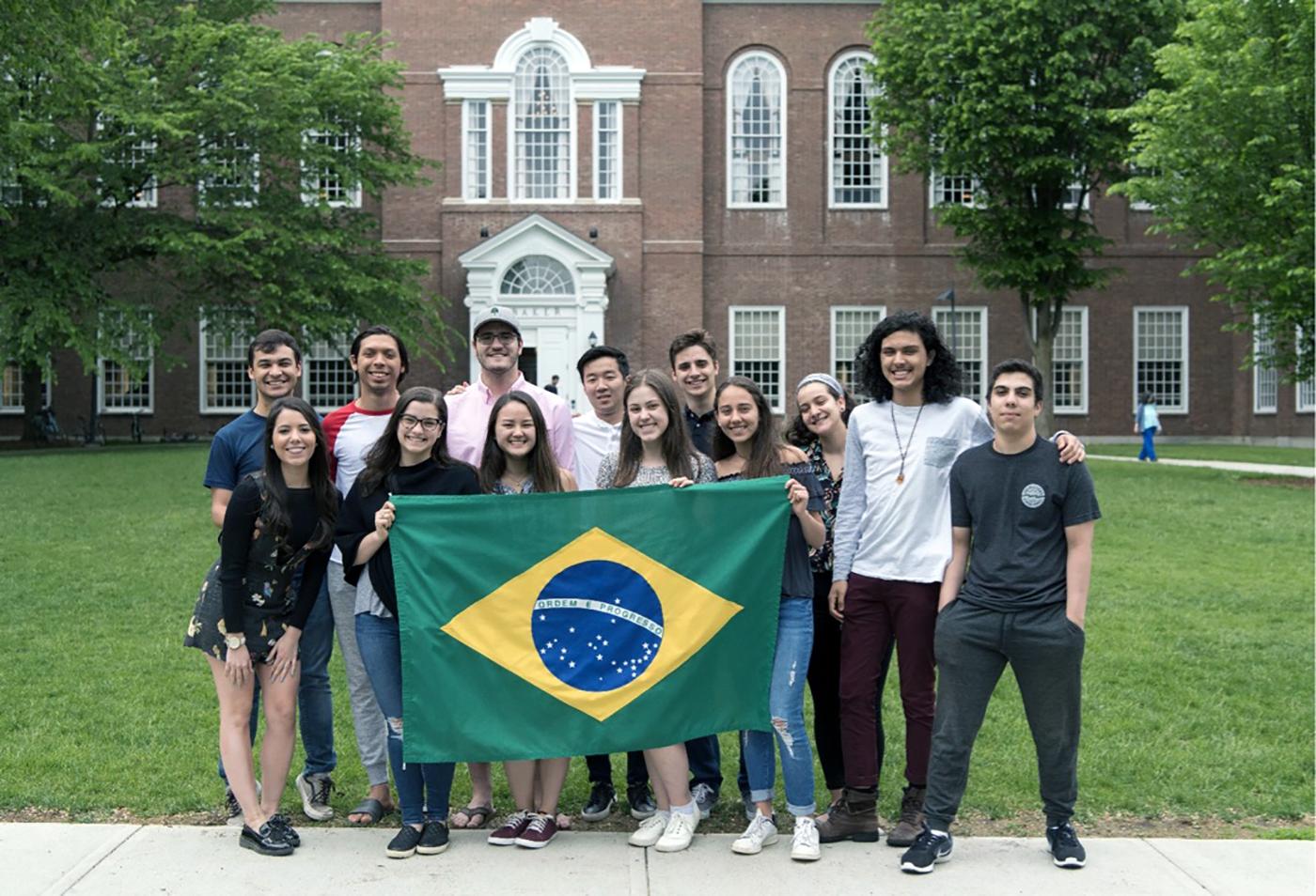 Group of Dartmouth students with a Brazilian flag