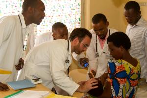 Dartmouth researchers with patients in Uganda