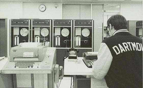 Man in a computer lab in the 1970's